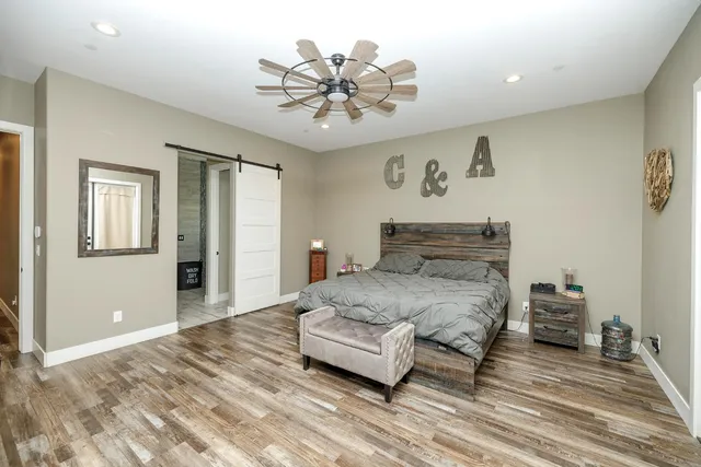 a bathroom with a bathtub and window