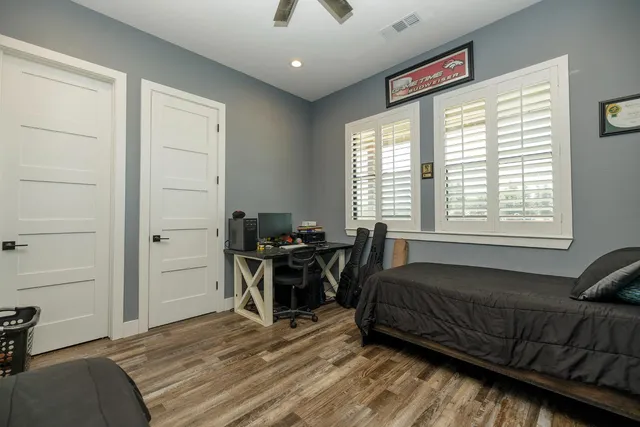 a bathroom with a toilet sink and shower