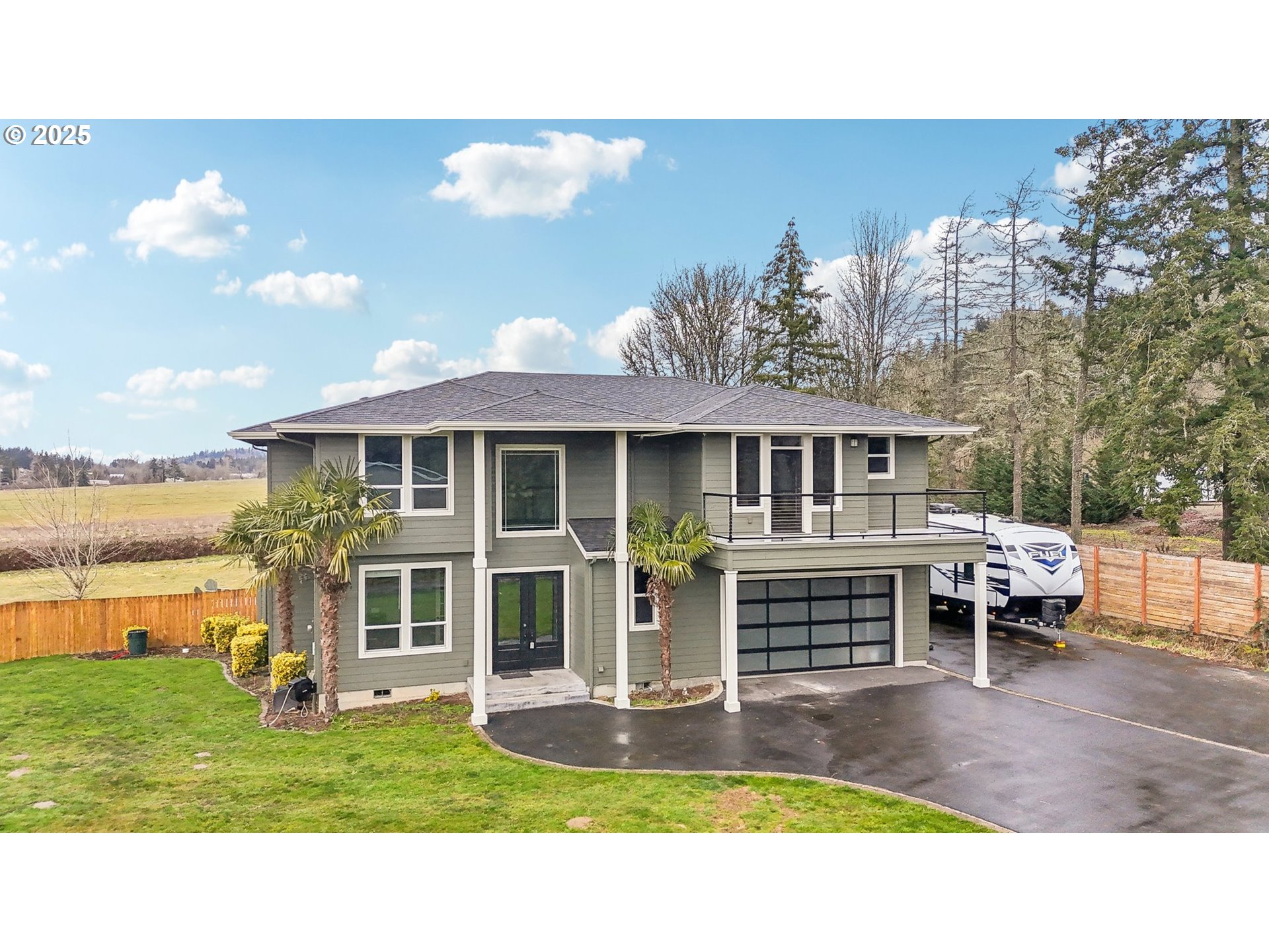 18147 Southeast Troge Road Damascus, OR 97089 - Photo 1 of 45 a view of a house with backyard porch and patio