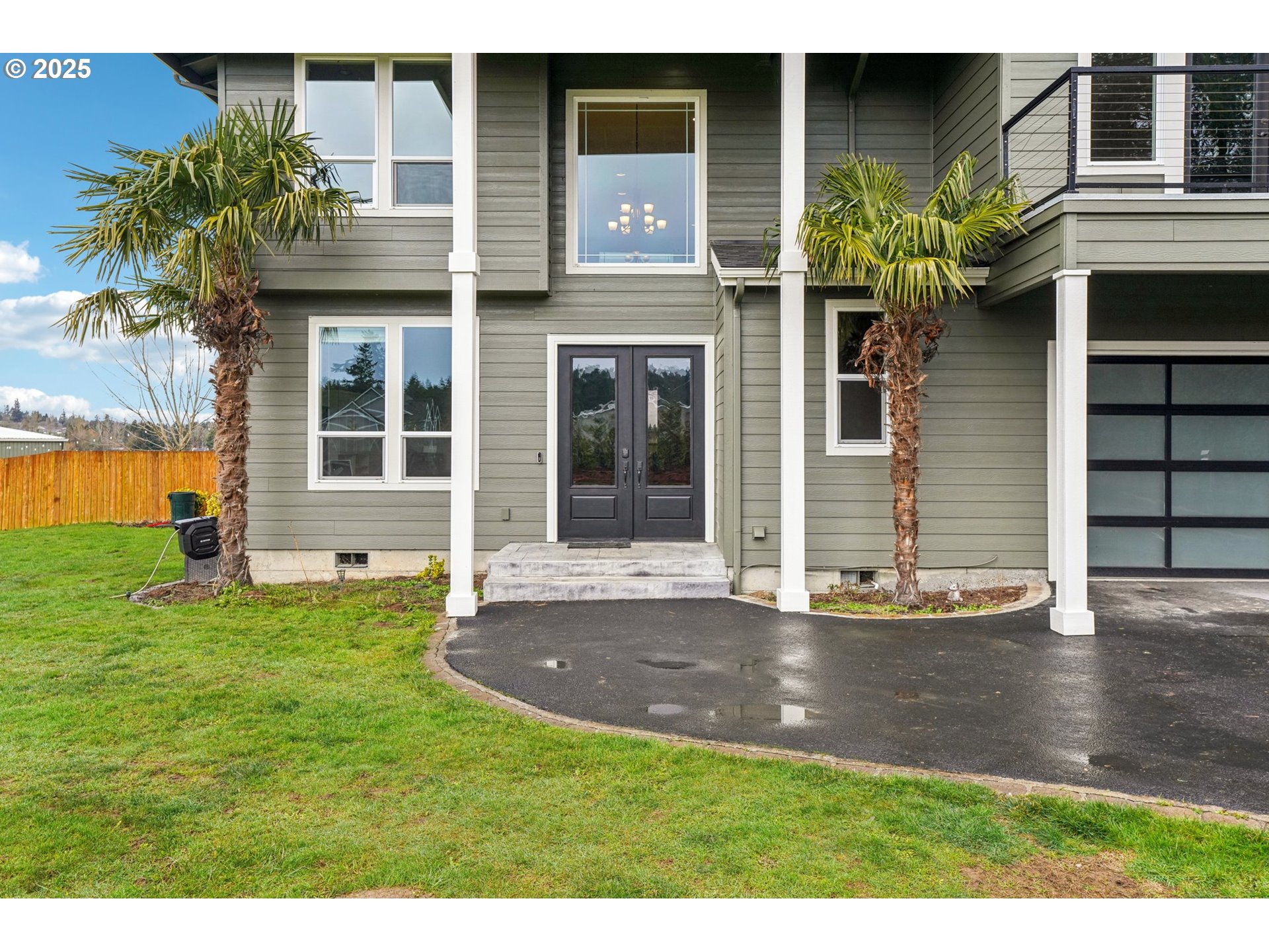 18147 Southeast Troge Road Damascus, OR 97089 - Photo 5 of 45 a front view of a house with a yard