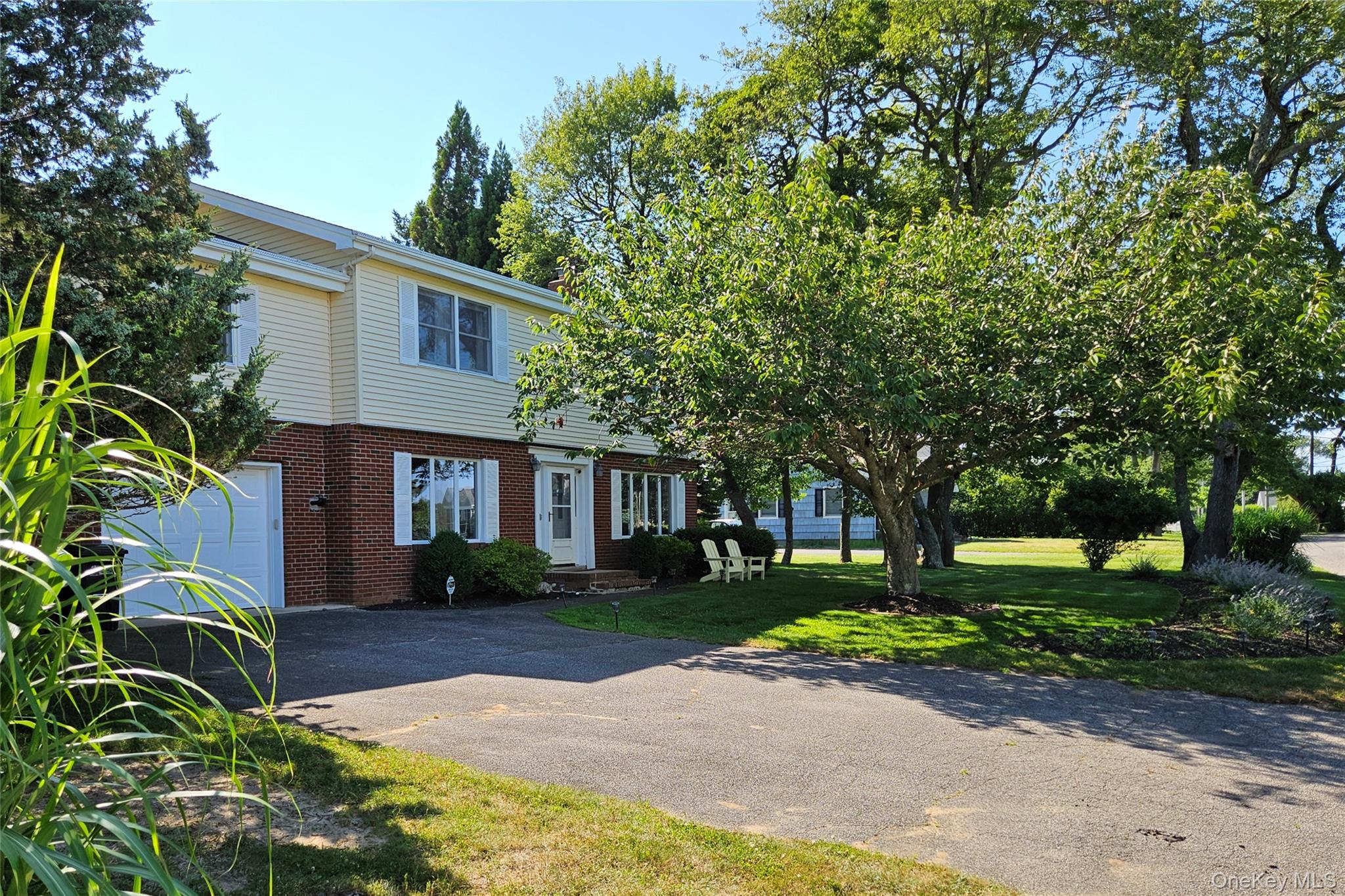 3650 Bay Shore Road Greenport, NY 11944 - Photo 12 of 30 a front view of house with yard and green space
