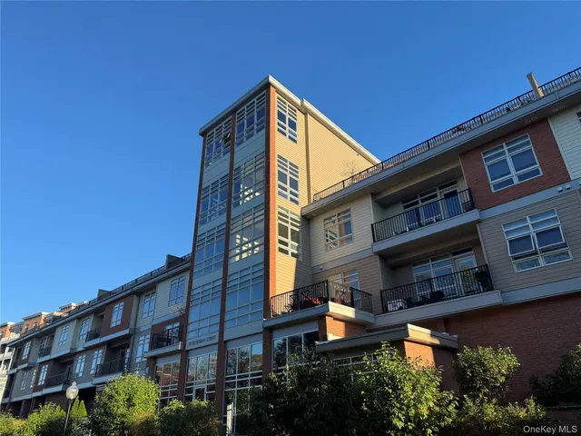 a view of a building with a street
