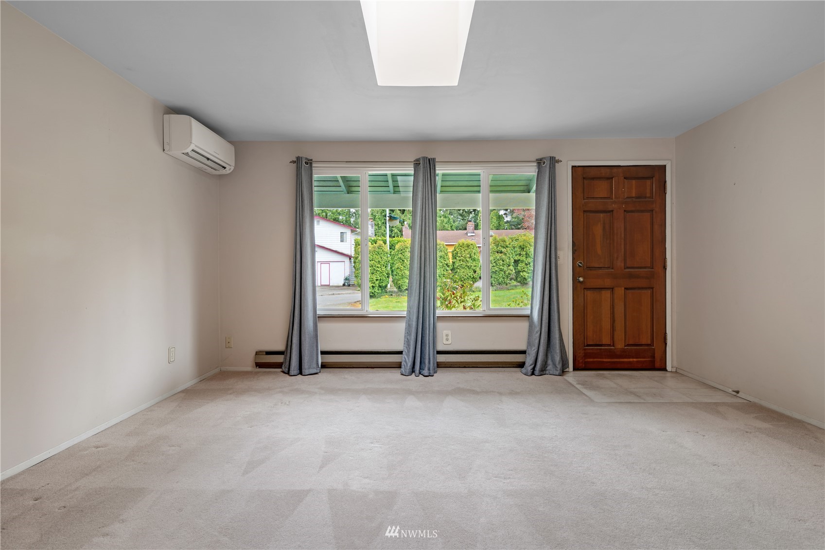 19 222nd Street Southwest Bothell, WA 98021 - Photo 3 of 29 an empty room with windows