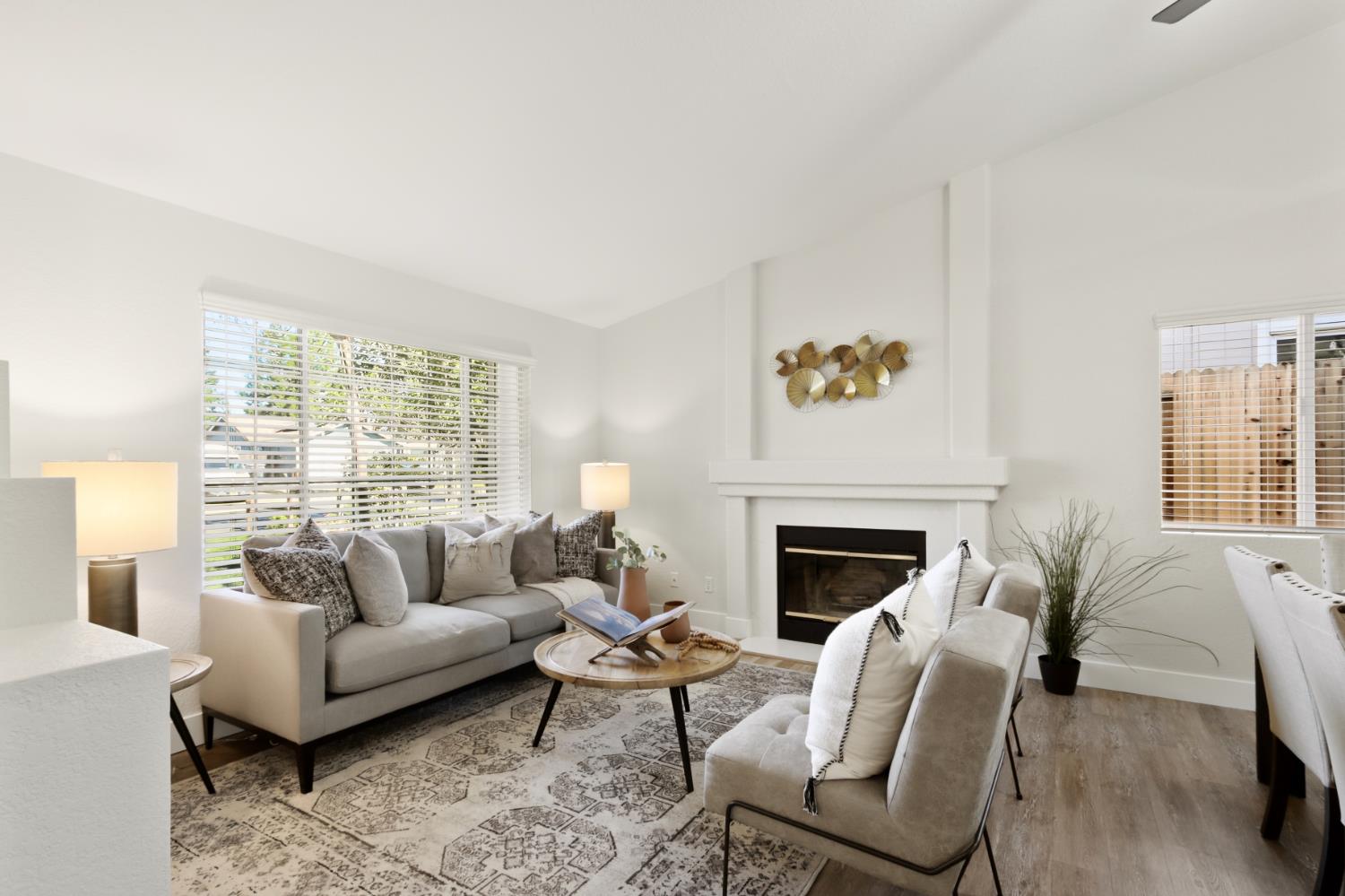 4711 Stuart Street Rocklin, CA 95765 - Photo 3 of 48 a living room with furniture fireplace and window