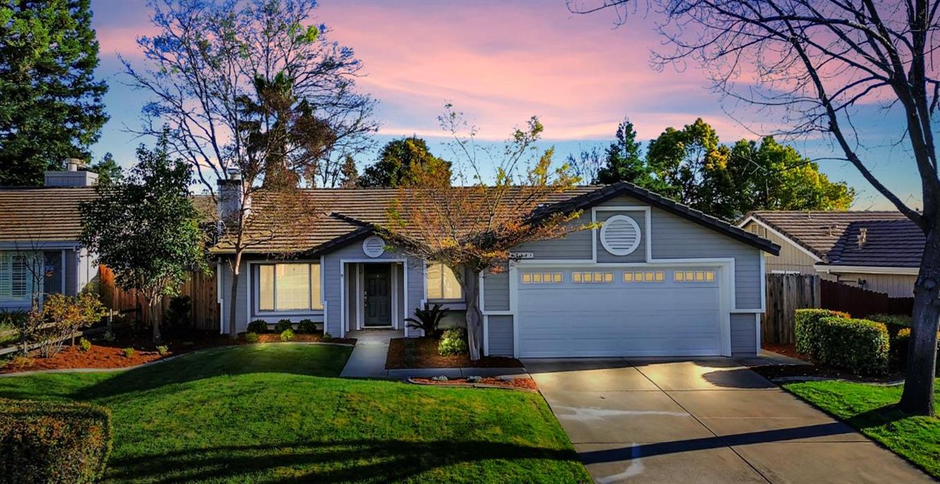 4711 Stuart Street Rocklin, CA 95765 - Photo 48 of 48 a front view of a house with garden