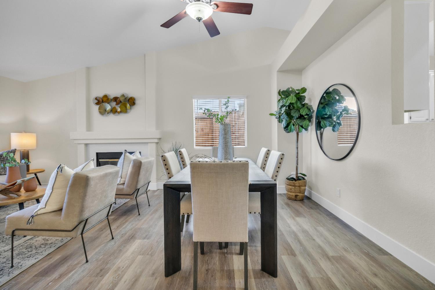 4711 Stuart Street Rocklin, CA 95765 - Photo 9 of 48 a view of a dining room with furniture chandelier and wooden floor