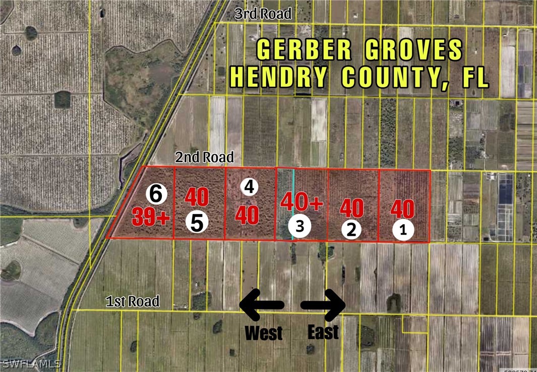 0 2nd Road LaBelle, FL 33935 - Photo 2 of 8 a street sign that is on a pole