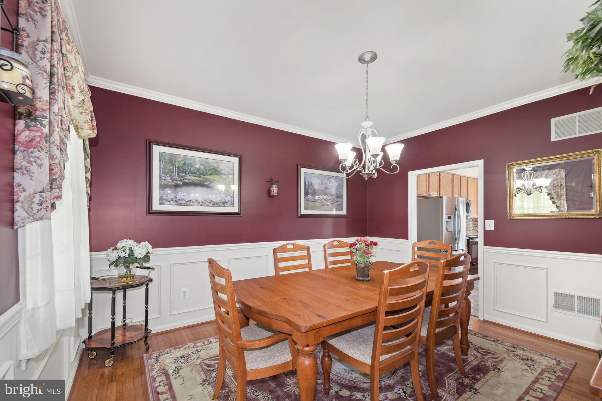 3221 Coon Club Road Hampstead, MD 21074 - Photo 17 of 58 Dining Rm from Foyer w/picture framing on walls