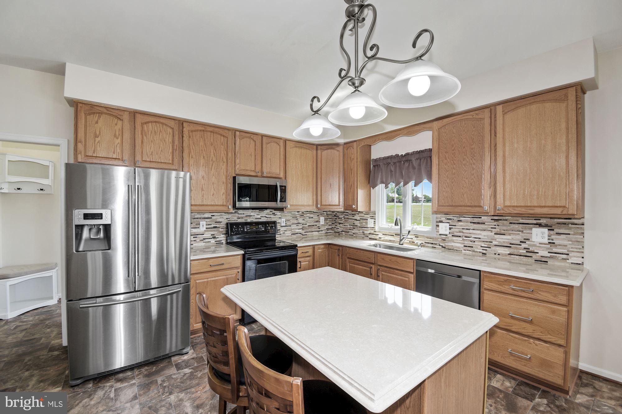 3221 Coon Club Road Hampstead, MD 21074 - Photo 19 of 58 Kitchen w/Quartz Counters & Island