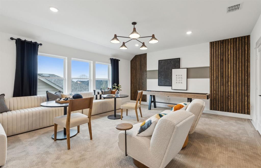 300 Brookhurst Road Little Elm, TX 75068 - Photo 9 of 20 a living room with furniture and a large window