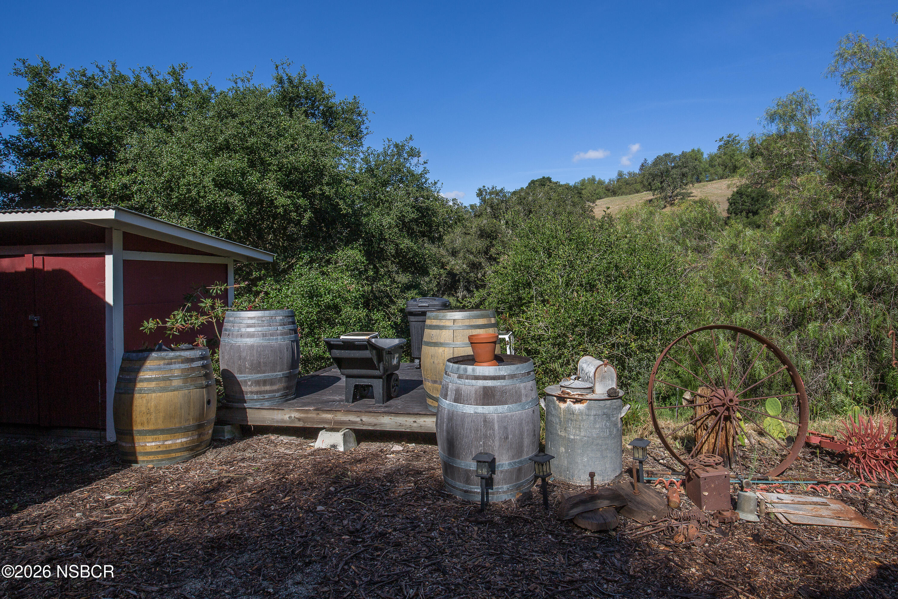 850 Fredensborg Canyon Road Solvang, CA 93463 - Photo 25 of 26 a view of a backyard with sitting area