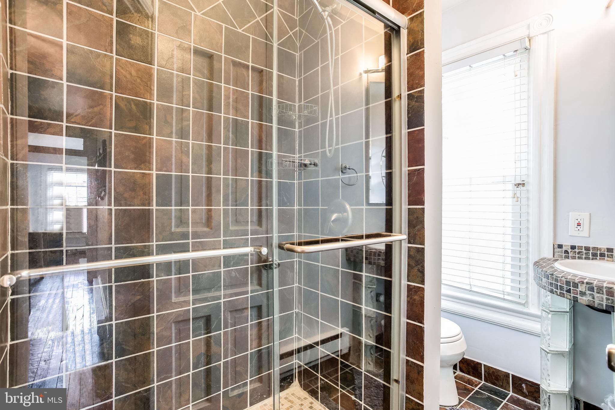 1211 33rd Street Northwest, Unit 2 Washington, DC 20007 - Photo 20 of 23 a bathroom with a shower