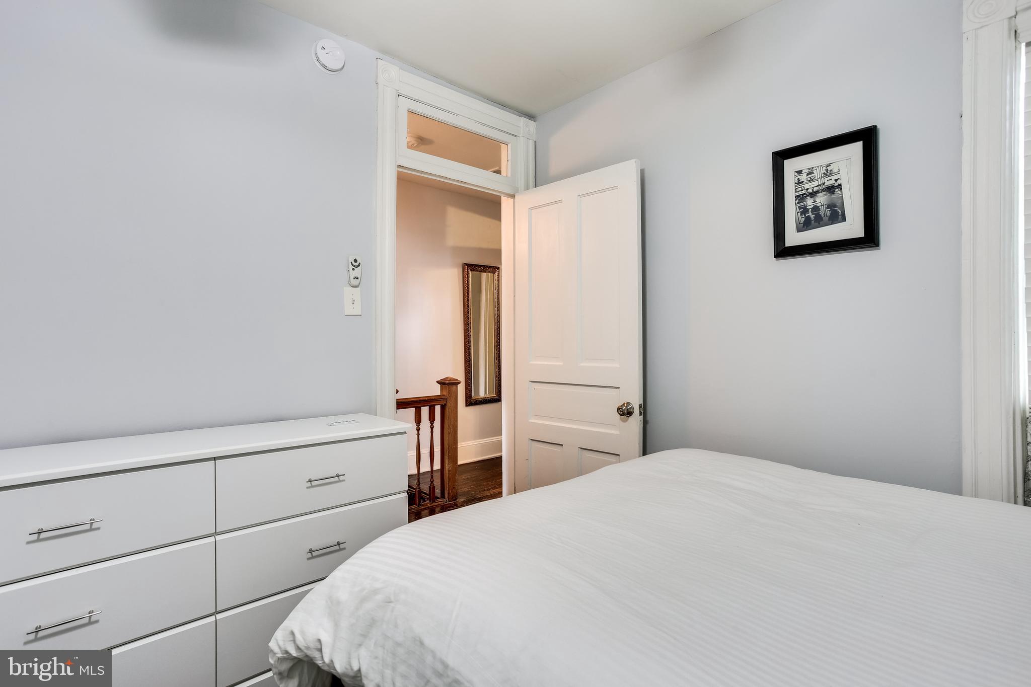 1211 33rd Street Northwest, Unit 2 Washington, DC 20007 - Photo 23 of 23 a bedroom with a bed and closet