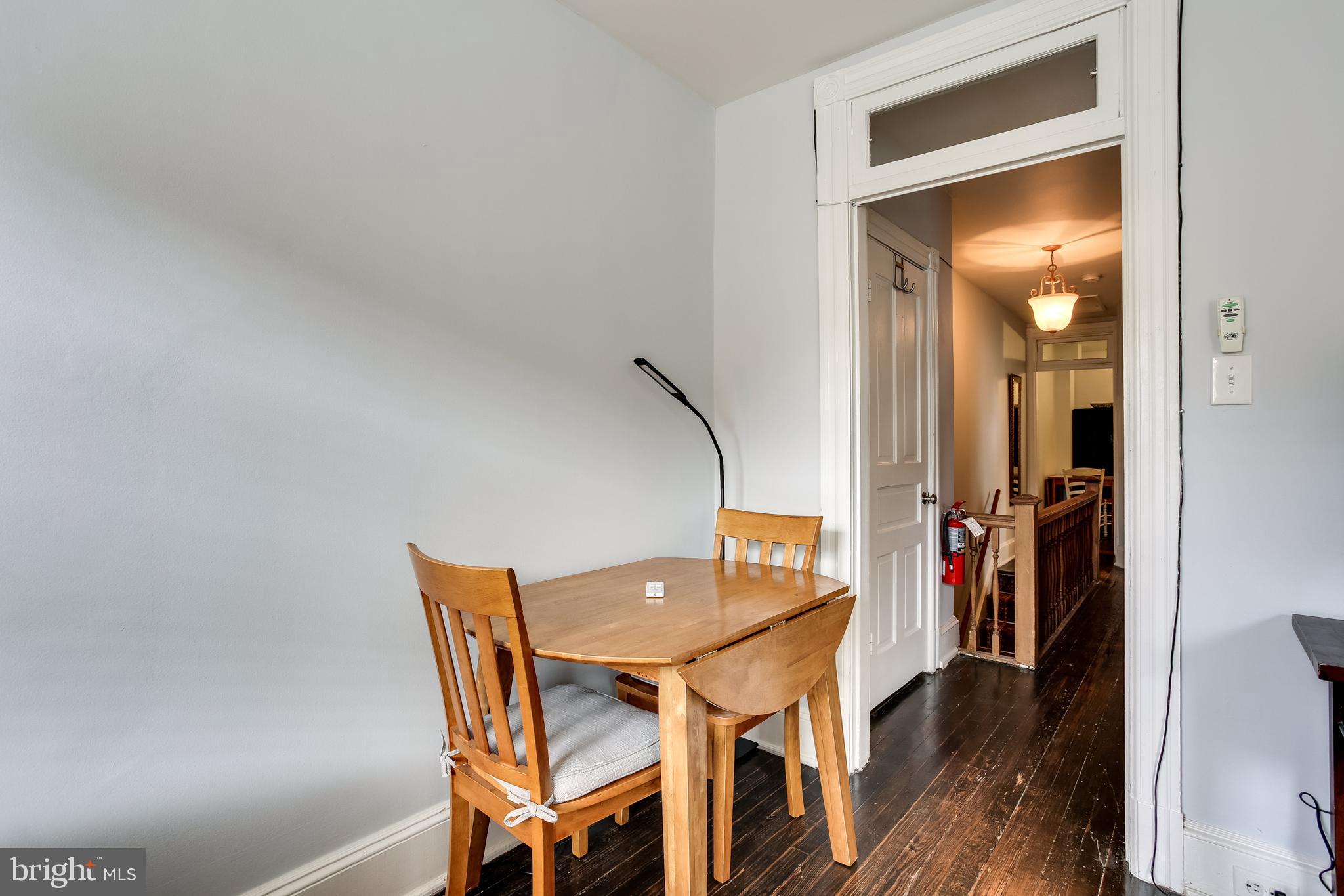 1211 33rd Street Northwest, Unit 2 Washington, DC 20007 - Photo 6 of 23 a view of a dining room with furniture and wooden floor
