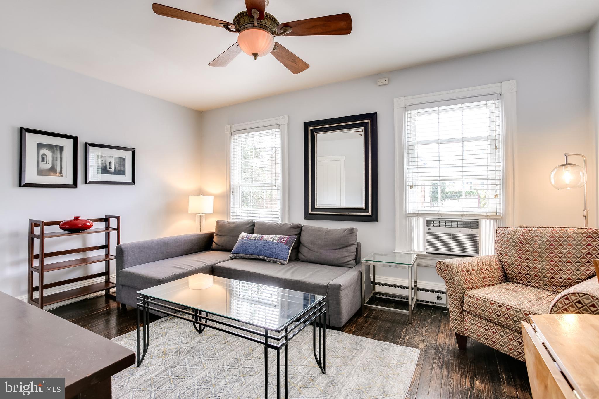 1211 33rd Street Northwest, Unit 2 Washington, DC 20007 - Photo 8 of 23 a living room with furniture and a window