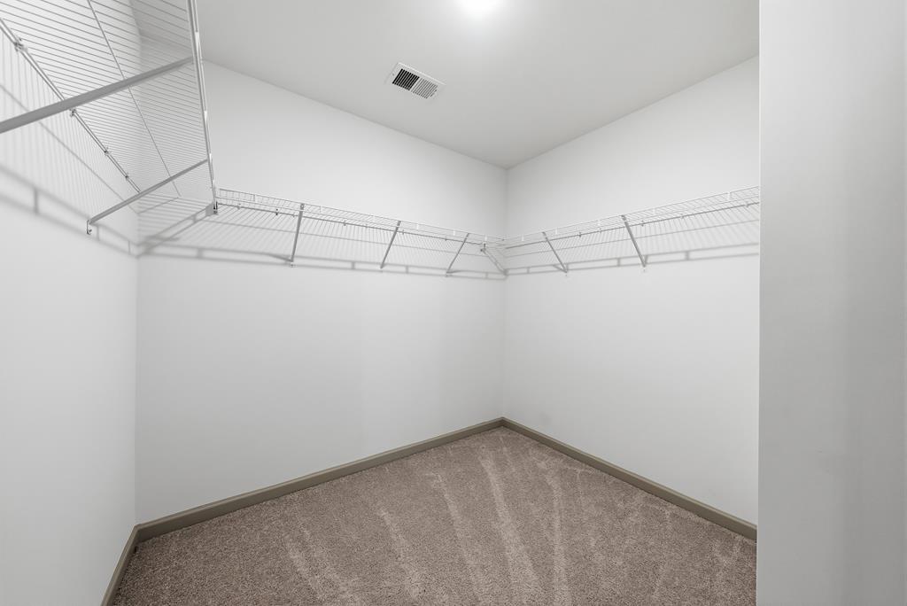 331 Lee Road 0357 Valley, AL 36854 - Photo 17 of 30 a view of a room with racks on the wall