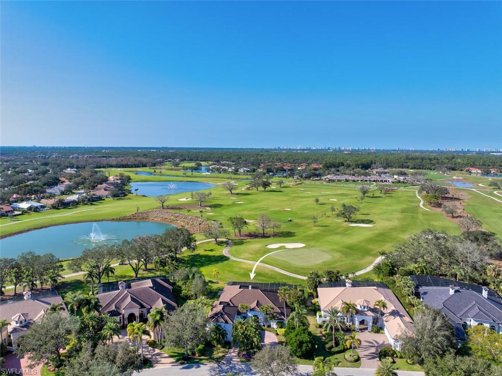 400 Terracina Way Naples, FL 34119 - Photo 2 of 29 Drone / aerial view with a water view