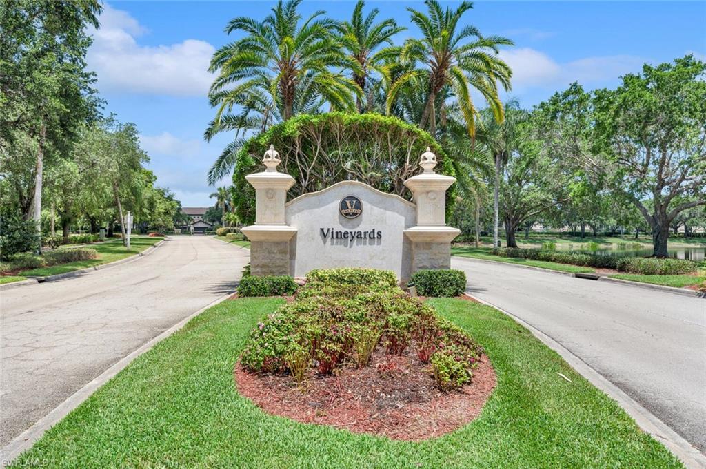 400 Terracina Way Naples, FL 34119 - Photo 26 of 29 View of community / neighborhood sign