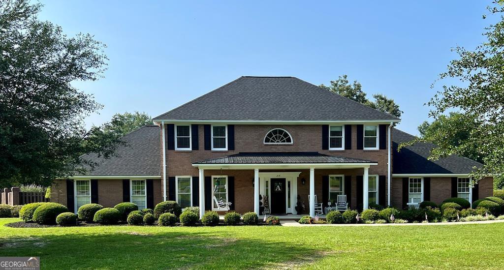 215 Ridge Circle Dublin, GA 31021 - Photo 1 of 1 front view of a house with a yard