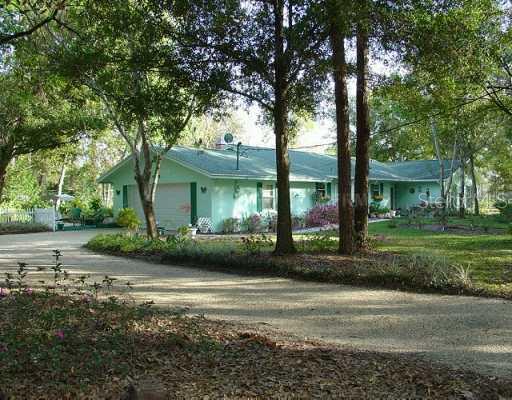 3081 Indiana Street Melbourne, FL 32904 - Photo 1 of 1 a view of a house with a garden
