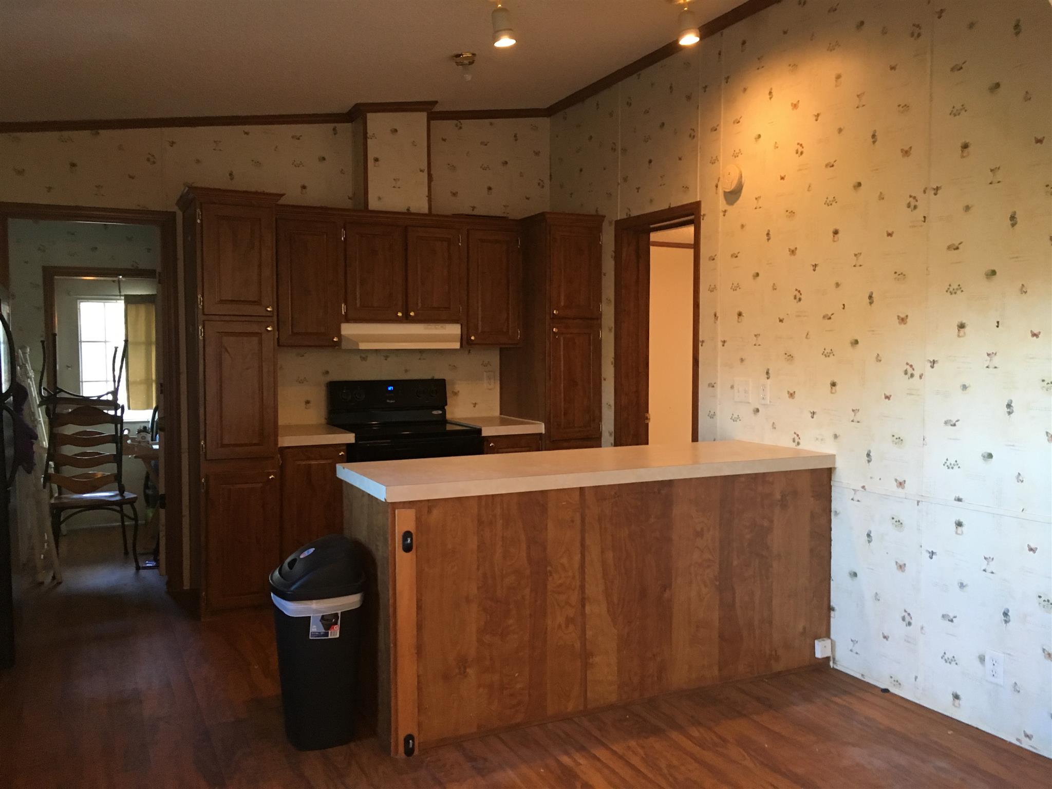 269 Hiwassee Road Lebanon, TN 37087 - Photo 4 of 7 a kitchen with a stove and a refrigerator