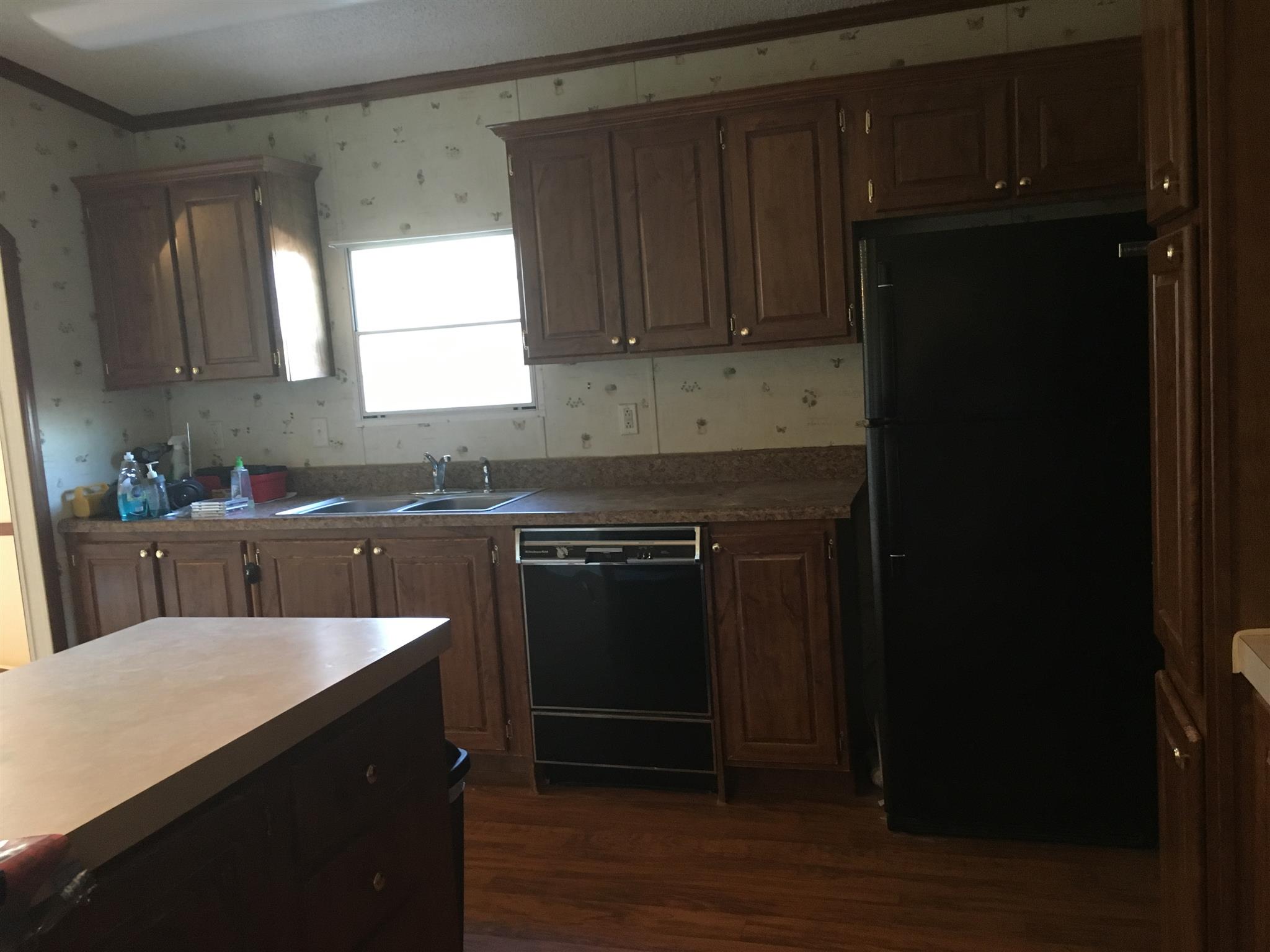 269 Hiwassee Road Lebanon, TN 37087 - Photo 5 of 7 a kitchen with a sink and a stove