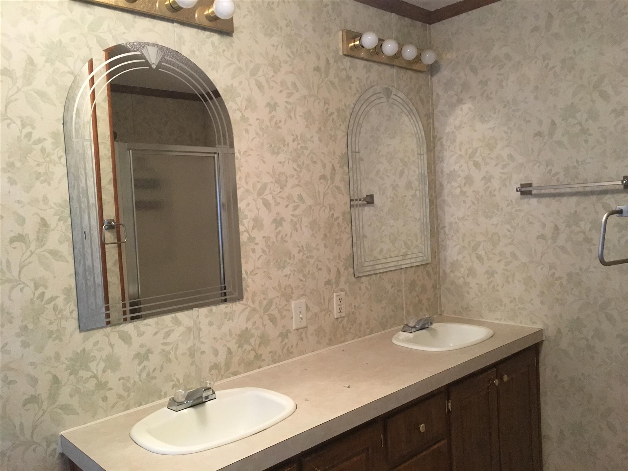 269 Hiwassee Road Lebanon, TN 37087 - Photo 7 of 7 a bathroom with a sink and a mirror