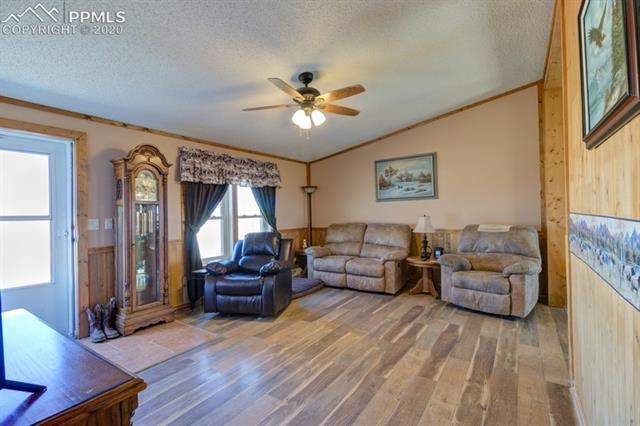 5705 South Yoder Road Yoder, CO 80864 - Photo 12 of 42 Living room