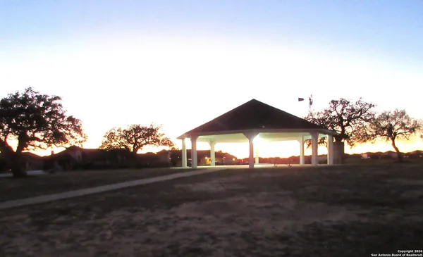 a view of a yard with an outdoor space