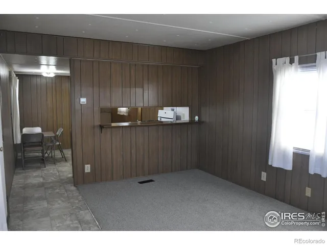 a view of a hallway with entryway