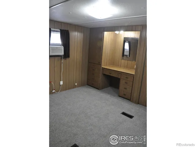 a en suite bathroom with a sink and mirror