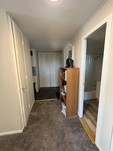 a view of a storage & utility room with a sink