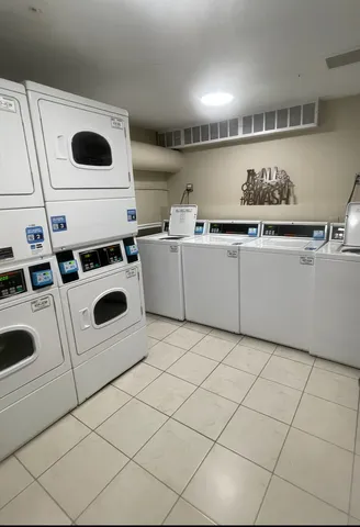 a kitchen with a stove and a microwave