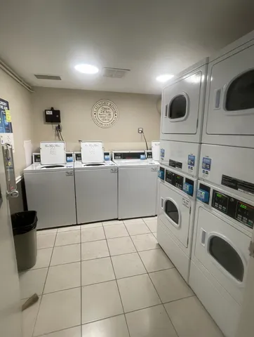 a kitchen with a sink a stove and refrigerator