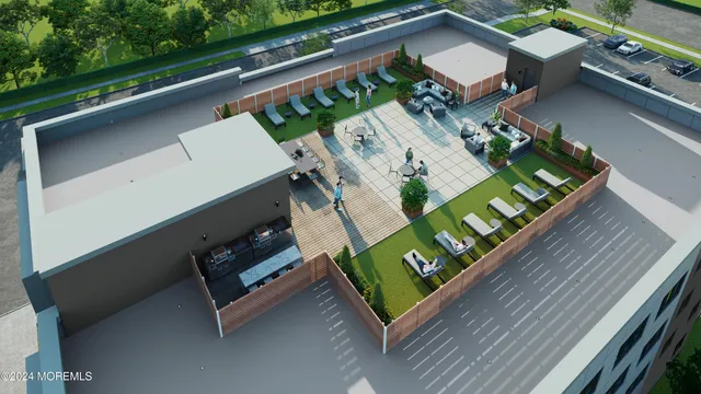 a living room with furniture flat screen tv and window