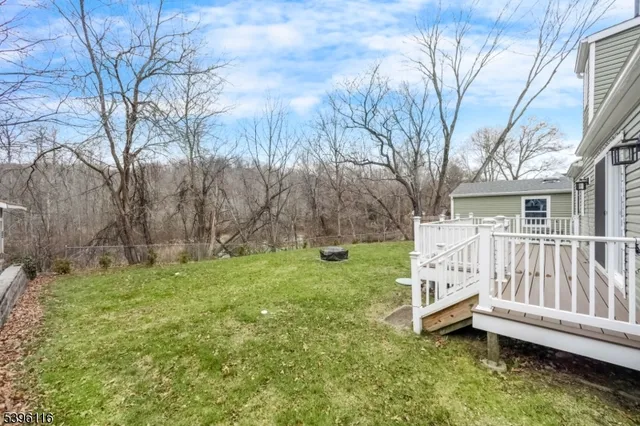 a view of a deck with a yard