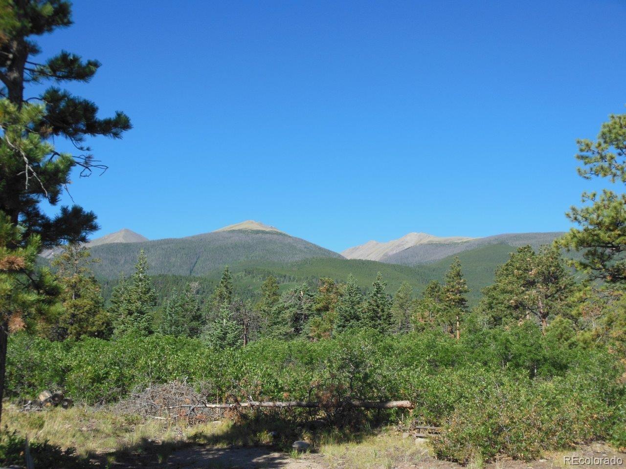 481 San Miguel Road Westcliffe, CO 81252 - Photo 24 of 26 a view of a mountain range with lush green forest