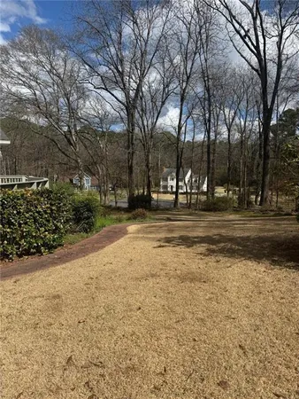 a view of road with trees