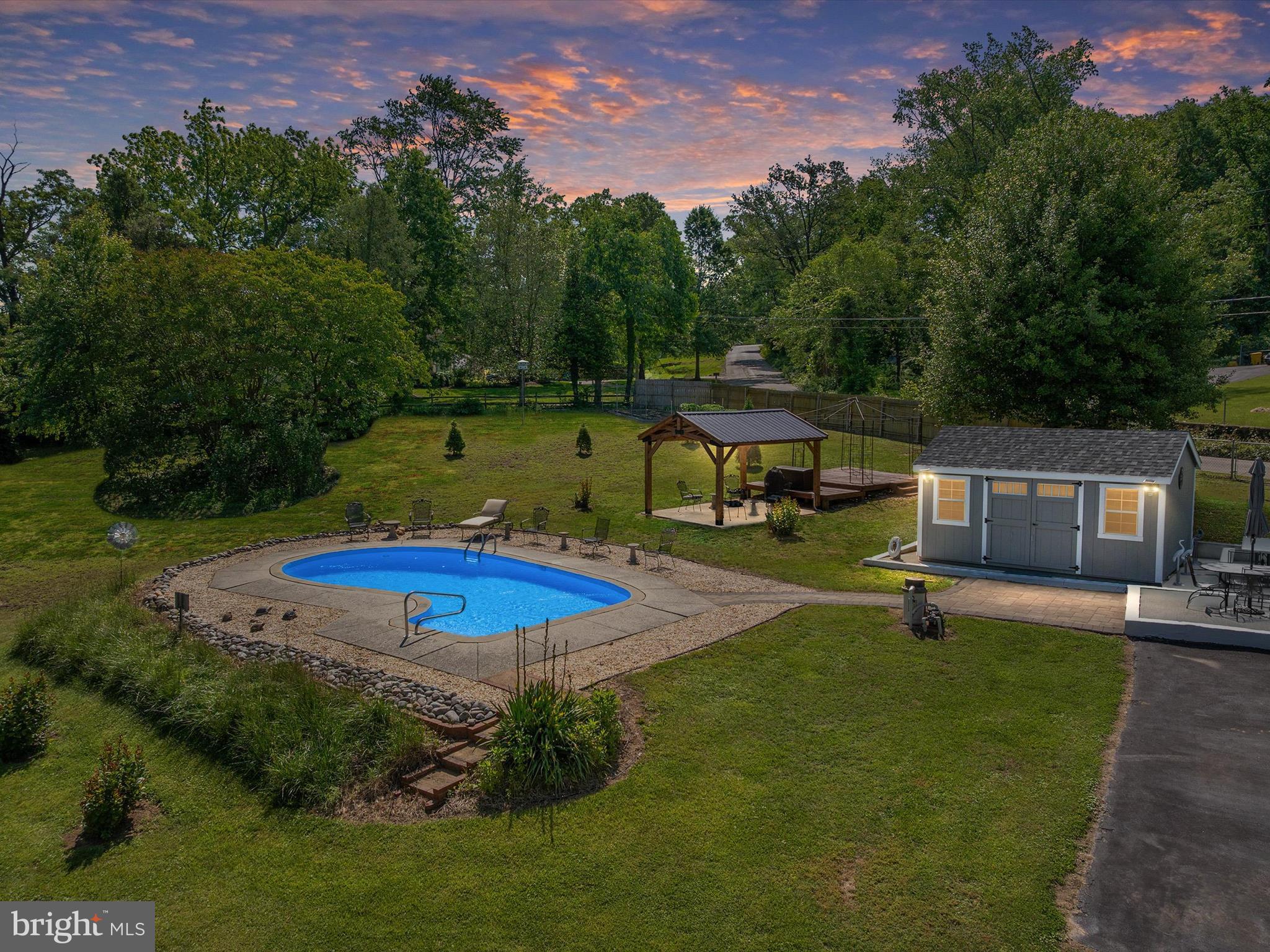 1101 Furnace Road Linthicum Heights, MD 21090 - Photo 2 of 73 an aerial view of a house with swimming pool and a yard