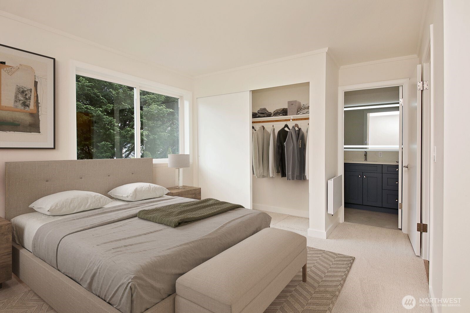 3760 Periwinkle Road Clinton, WA 98236 - Photo 21 of 34 a bedroom with a bed and a large window