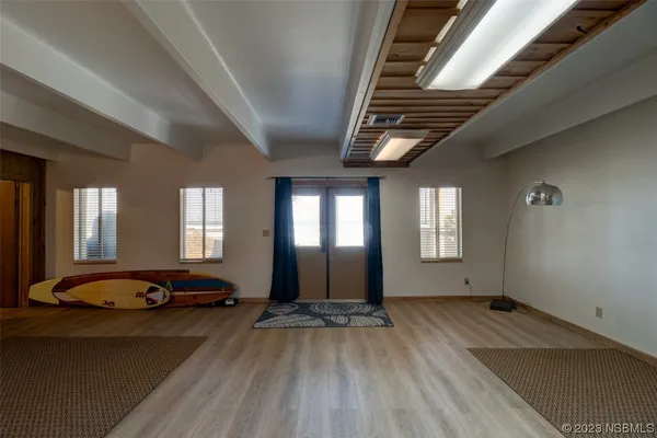 a view of a livingroom with furniture and window