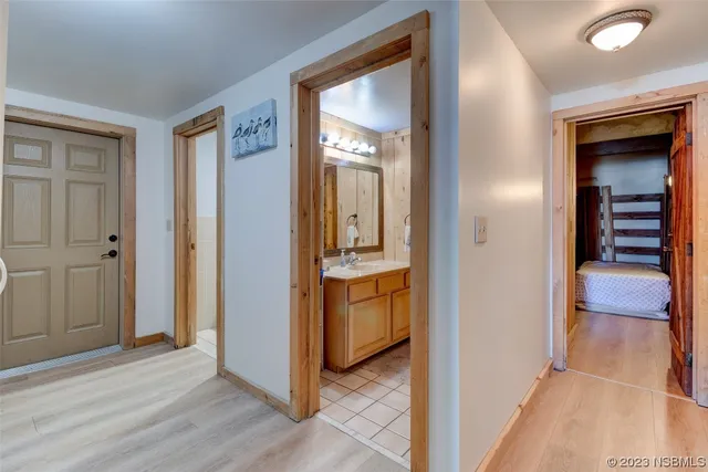 a bedroom with a bed and a walk in closet