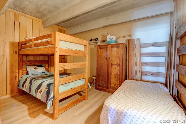 a bathroom with a sink a mirror and a shower