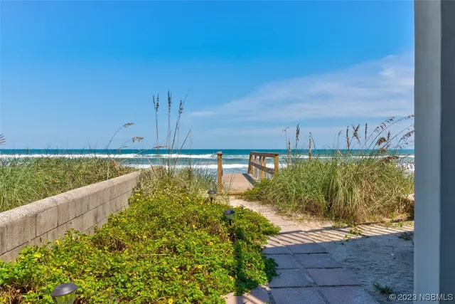 a view of a chairs and table on the wooden floor