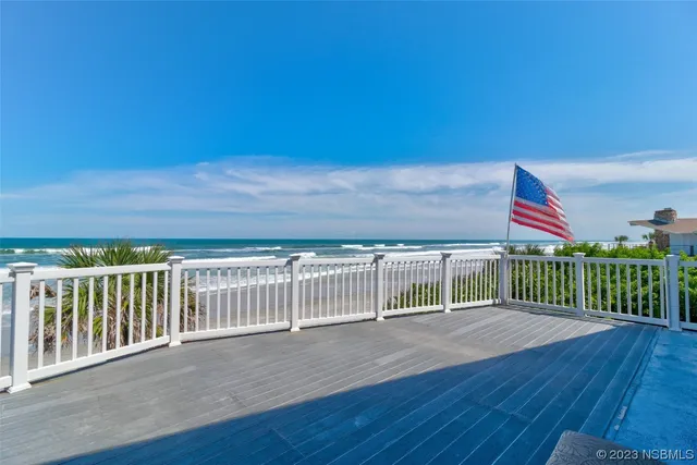 a view of a porch with furniture