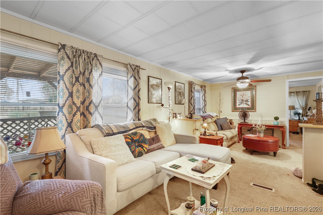 156 Connell Road Carthage, NC 28327 - Photo 2 of 43 a living room with furniture and a rug