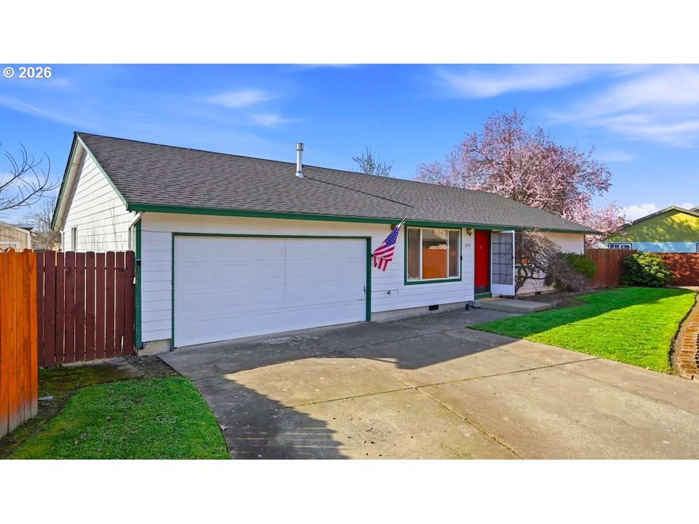 a house view with a backyard space