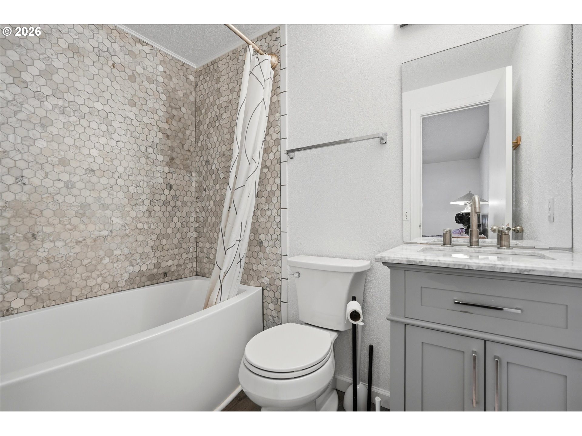 1255 Southwest 217th Avenue Beaverton, OR 97003 - Photo 24 of 33 a bathroom with a sink toilet and shower