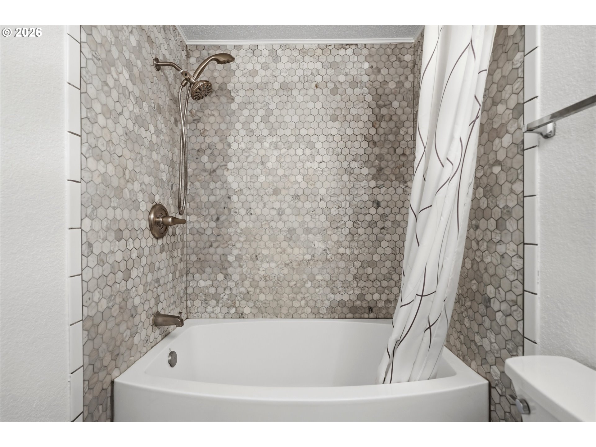 1255 Southwest 217th Avenue Beaverton, OR 97003 - Photo 25 of 33 a bathroom with a bathtub and shower