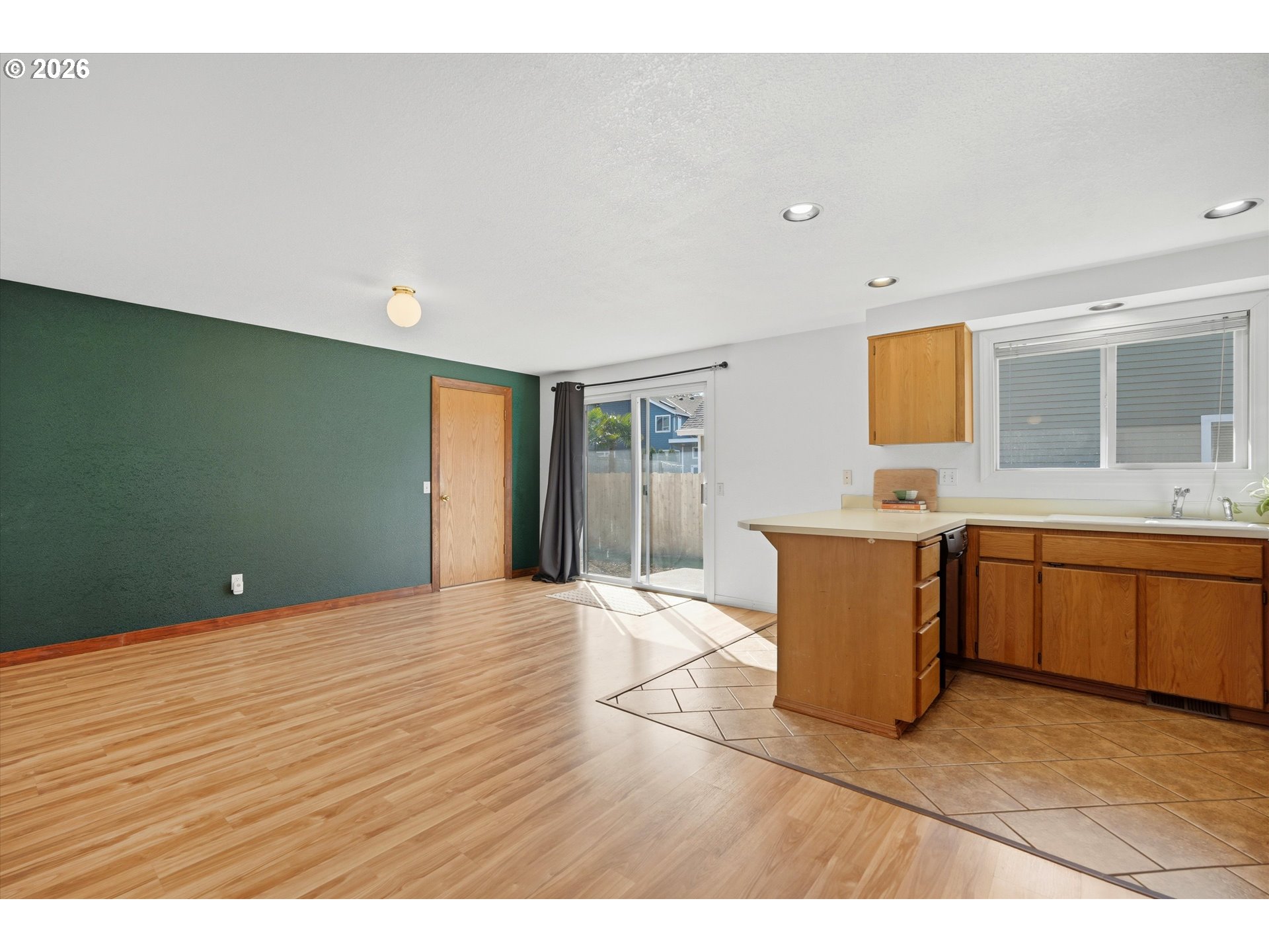 1255 Southwest 217th Avenue Beaverton, OR 97003 - Photo 8 of 33 a view of kitchen with wooden floor